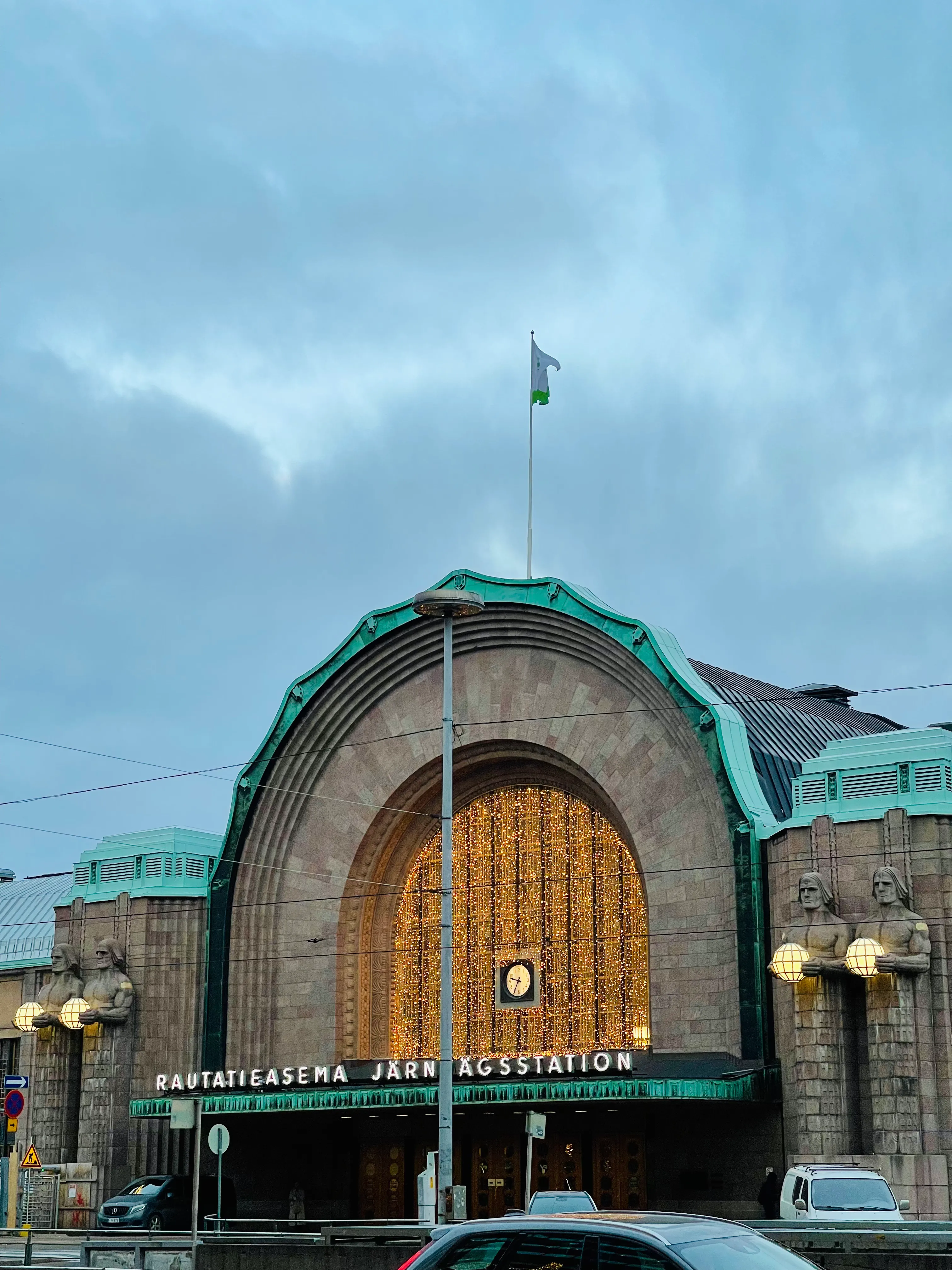 Helsinki Central Station lit up at dusk